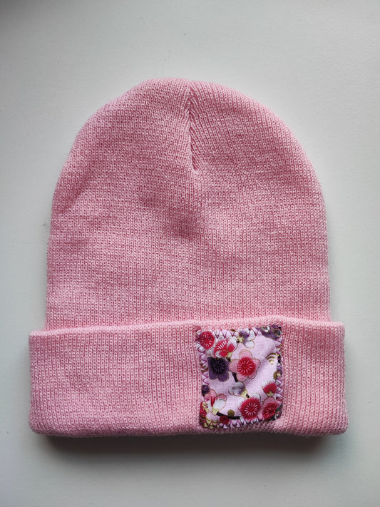 Bonnet rose poudré fleur de cerisier