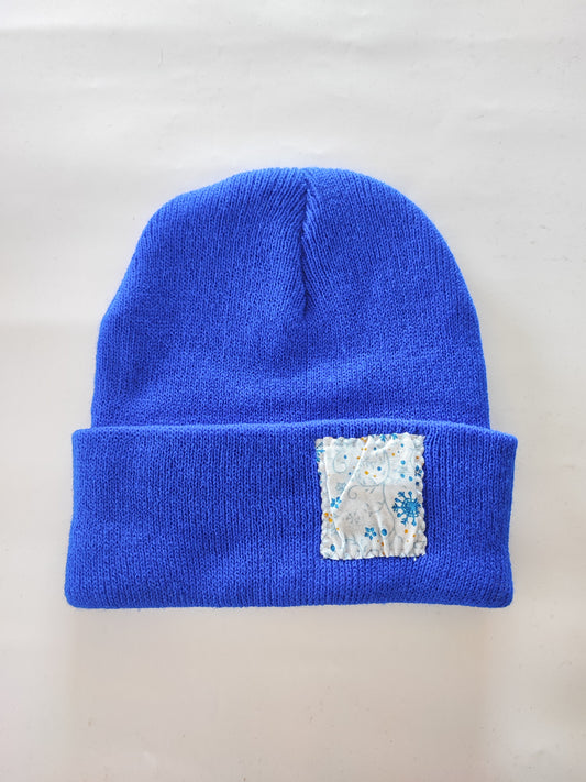 Bonnet motif flocon bleu