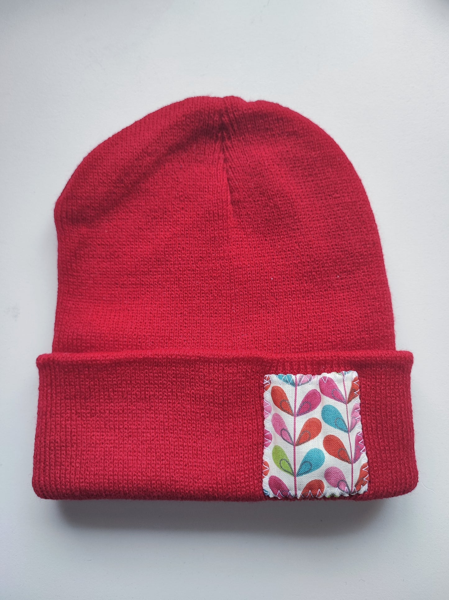 Bonnet rouge plante rose