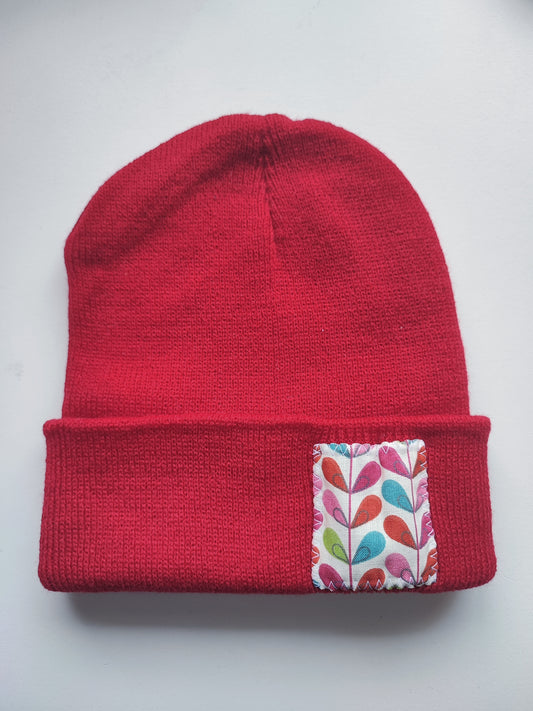 Bonnet rouge plante rose