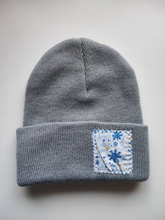 Bonnet gris uni flocon