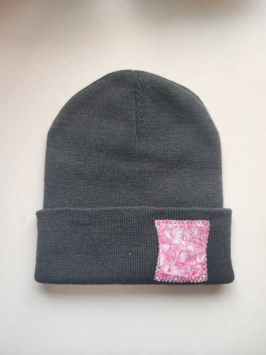 Bonnet noir fleur Fuschia