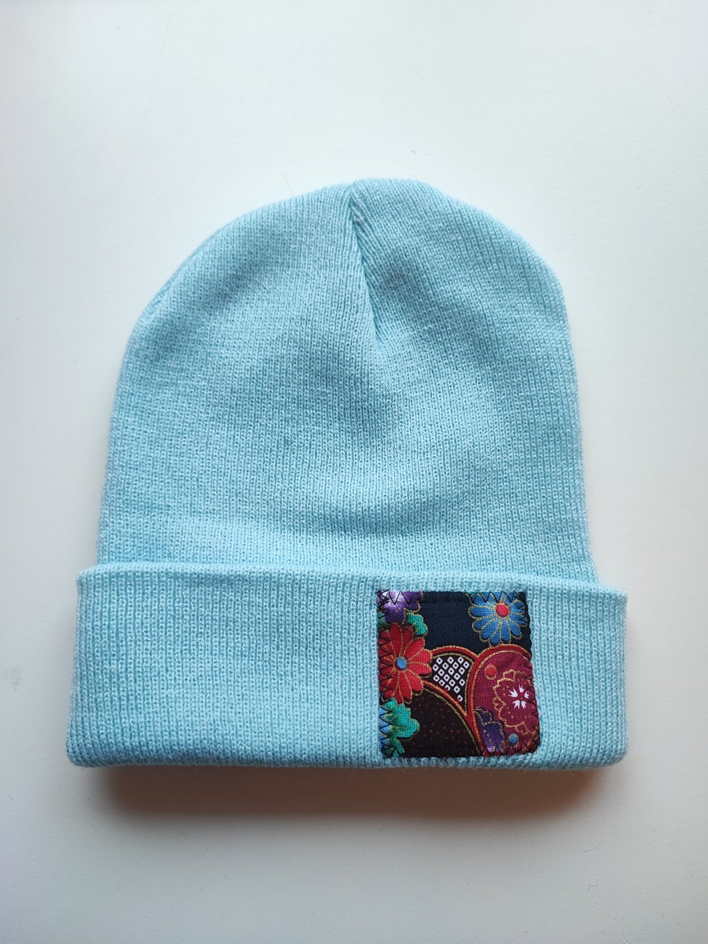 Bonnet bleu ciel bouquet floral